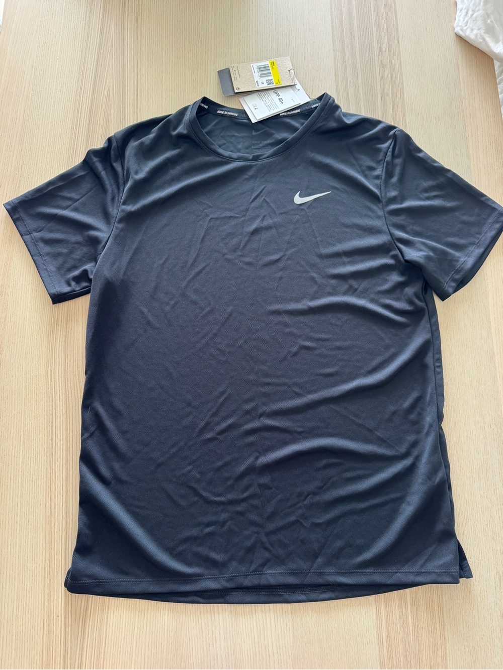 Nike Running Men’s Short Sleeve Athletic Tee in Black with Silver Swoosh